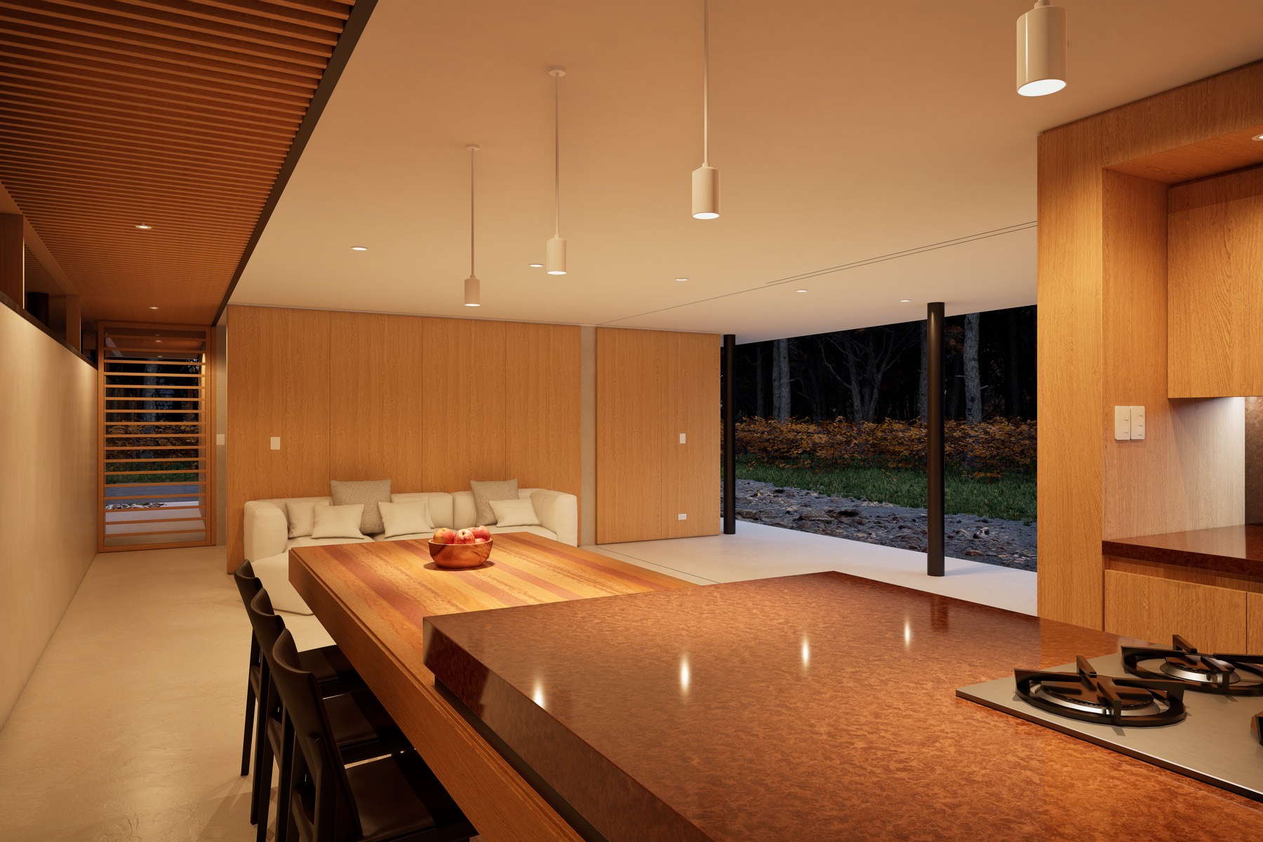 Kitchen island facing a full-height glazed wall onto the paddock